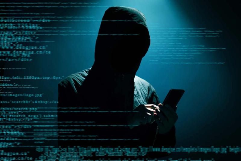Hacker using a phone