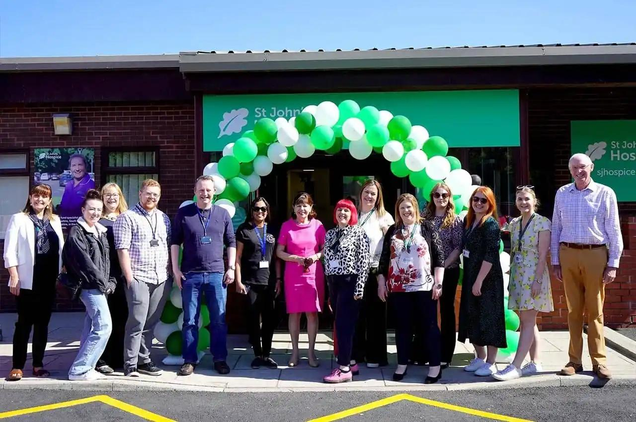Premierline team outside the St Johns Hospice charity shop