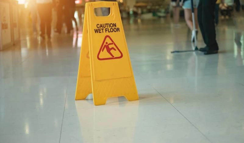Wet floor sign in an office