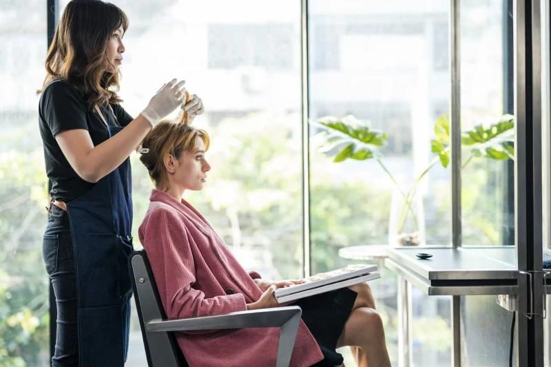 Customer in a bright hair salon